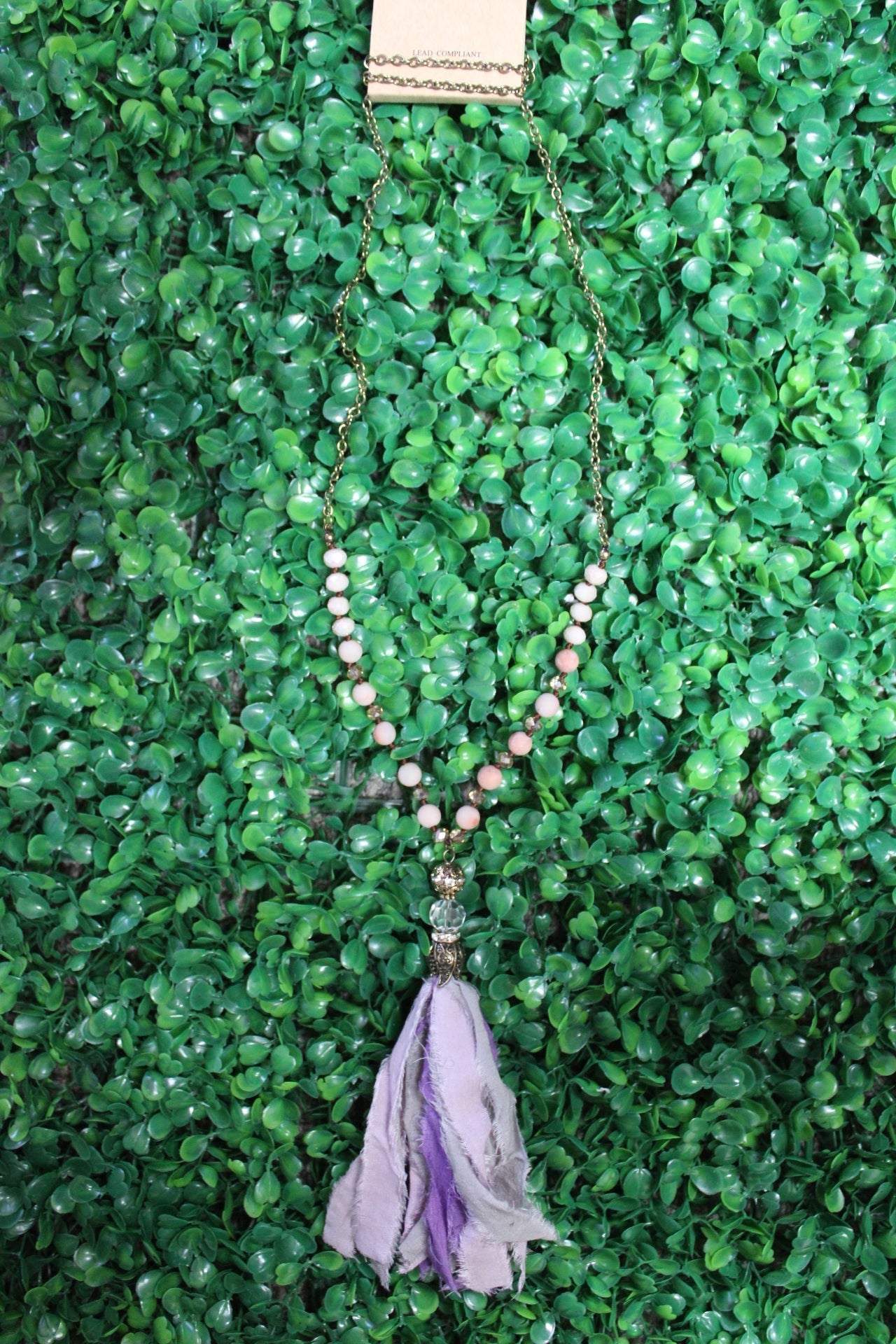 EMERALD TASSEL GOLD NECKLACE